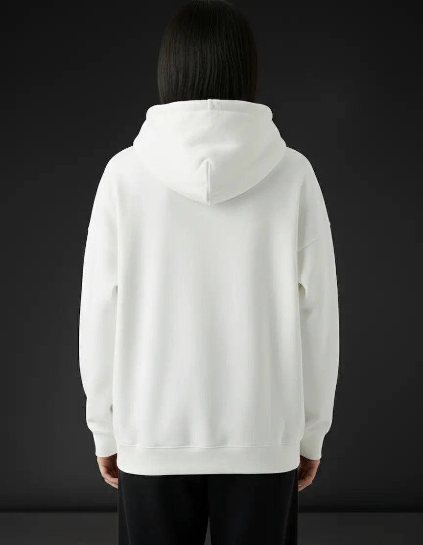 Person wearing a white hoodie with a black background