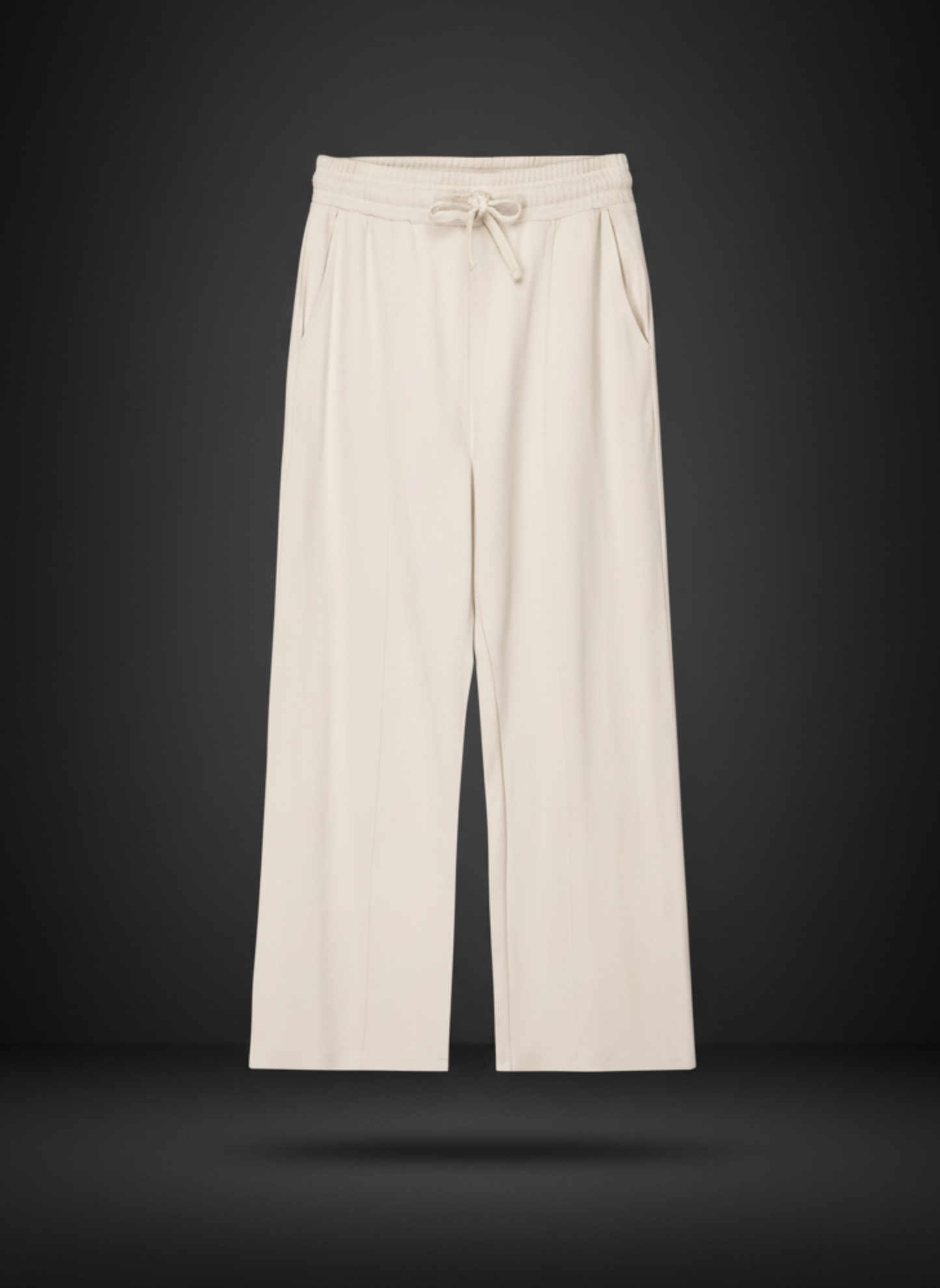 Beige wide-leg pants with drawstring waist on a black background