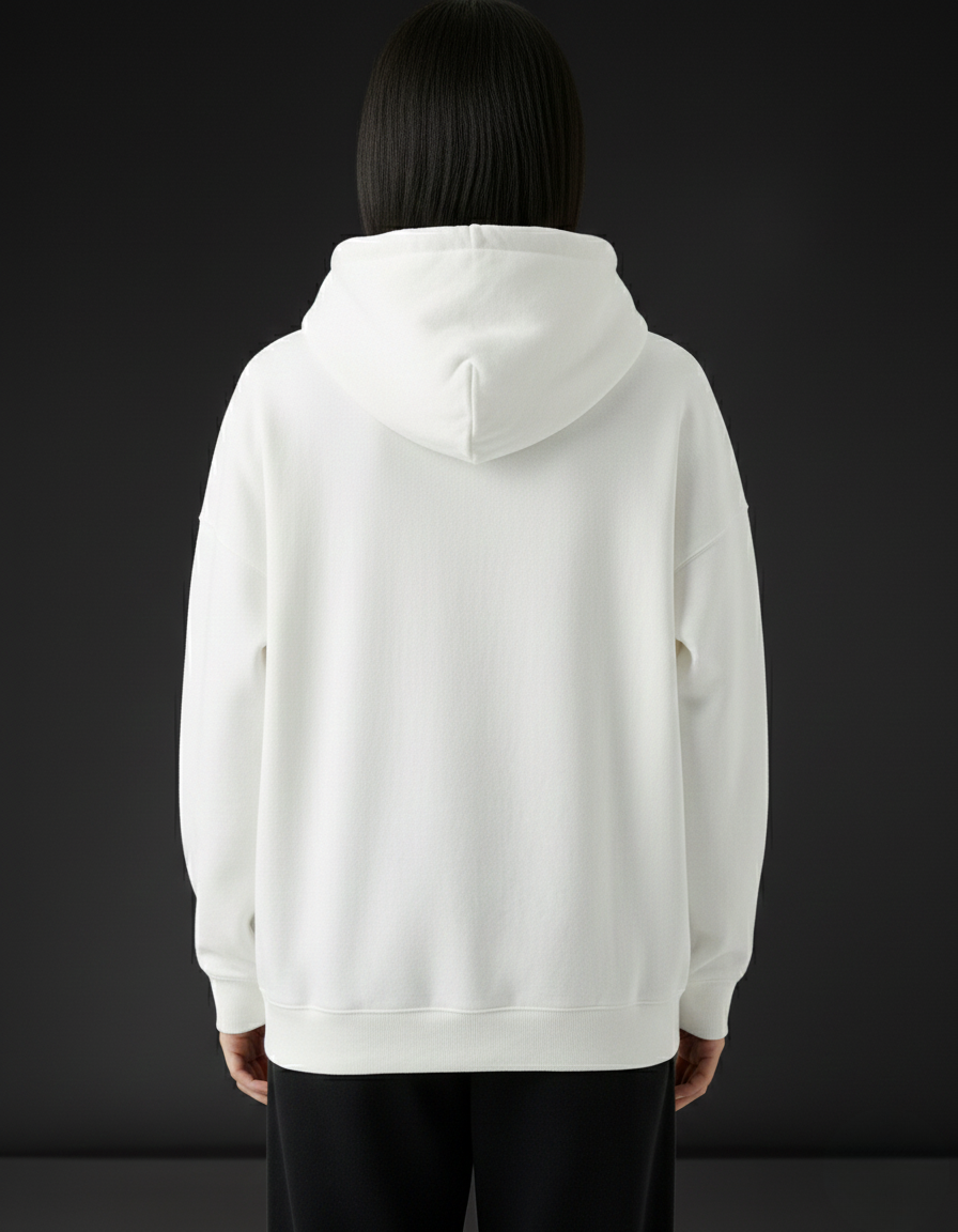 Person wearing a white hoodie with a black background