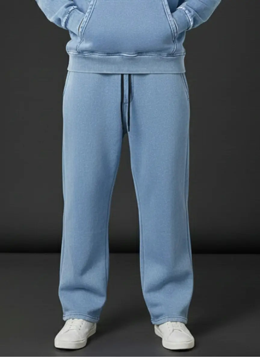 Person wearing a Ice Blue Trouser against a dark background