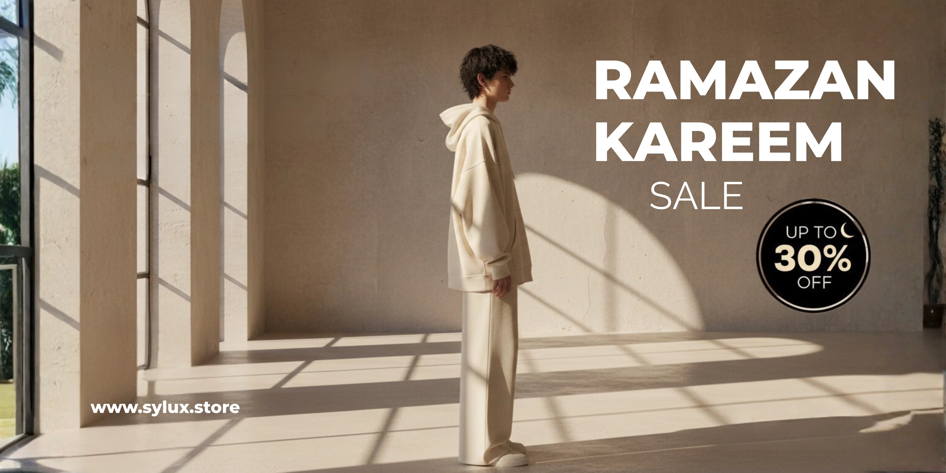 Person in a beige outfit standing in a sunlit room with 'Ramazan Kareem Sale' text and discount offer.
